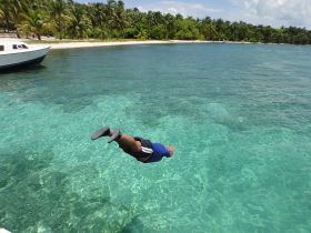 Ambergris Caye diving off a pier – Best Places In The World To Retire – International Living
